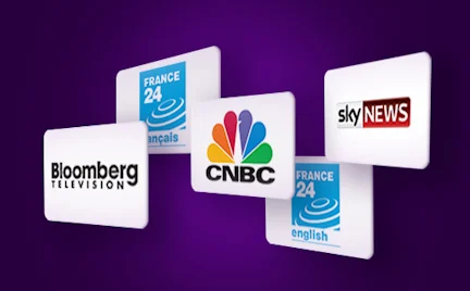 Naujienų kanalų kortelės ant violetinio fono: Bloomberg Television, CNBC, Sky News, France 24